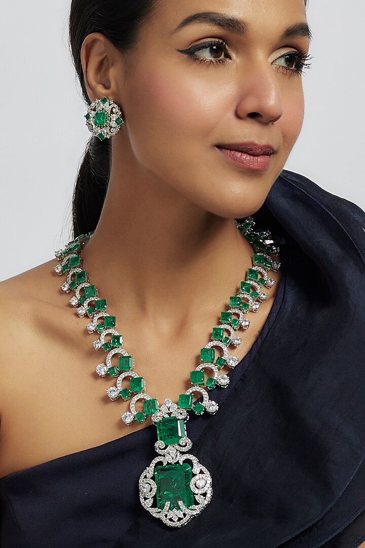 White Finish Emerald Green Zircon Long Pendant Necklace Set by Moh-Maya by Disha Khatri at Pernia's Pop Up Shop